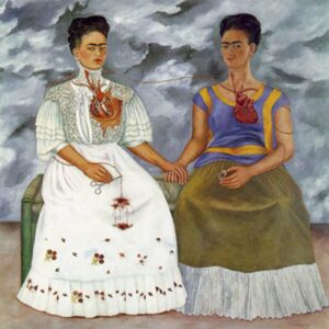 Crediti: "Le due Frida" di Frida Kahlo, conservata al Museo de Arte Moderno di Città del Messico, immagine visualizzata su FeelTheArt, distribuita sotto licenza CC BY-SA 4.0 (https://app.fta.art/it/artwork/099a68f6a05bf77c6aa04fa5dbd0bc7286eb2a11).